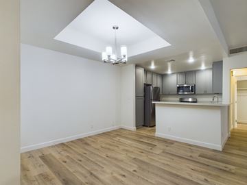 Valley Village apartment for rent - A kitchen with a white counter and a refrigerator.