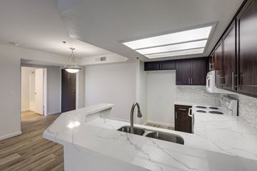 Sherman Oaks apartment for rent - a kitchen with a large counter top and a sink