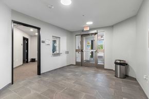Cedar Rapids apartment for rent - the preserve at ballantyne commons office space with hallways and glass doors