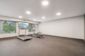 Iowa City apartment for rent - A room with a treadmill and exercise bike.