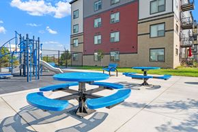Shakopee apartment for rent - Children's Playground with Picnic Area at Core Crossings Apartments