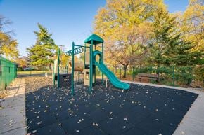Bloomington apartment for rent - A playground with a green slide