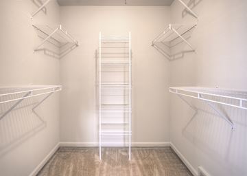 Williamsville townhouse for rent - Empty white shelves in a room.