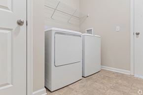 Farmington townhouse for rent - A white refrigerator and freezer in a kitchen.