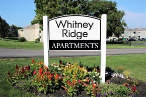 Fairport townhouse for rent - Property Sign at Whitney Ridge Apartments, New York