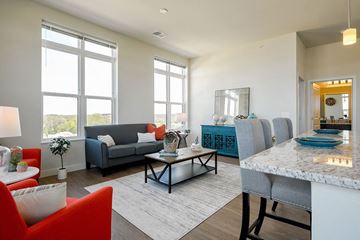 Fitchburg apartment for rent - a living room with a couch and a table
