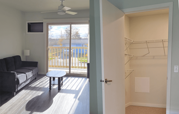 Fall River apartment for rent - a living room with a couch and a table and a balcony
