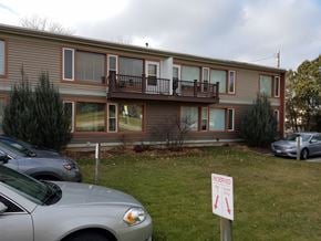 Monona apartment for rent - A sign in front of a car says