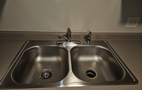 Mineral Point apartment for rent - a kitchen sink with two faucets
