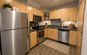 Madison apartment for rent - A modern kitchen with wooden cabinets and stainless steel appliances.