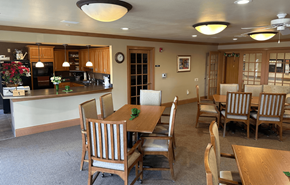 Greenfield apartment for rent - A dining room with a table set for six.