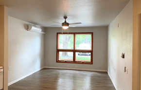 Lancaster apartment for rent - A room with a window and a ceiling fan.