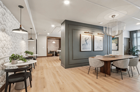 Brookfield apartment for rent - A modern dining room with a wooden table and chairs.