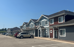 Darlington apartment for rent - A row of houses with cars parked in front.