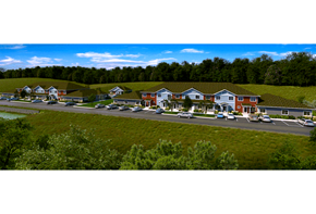 Darlington apartment for rent - A row of houses with a parking lot in front.