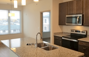 Madison apartment for rent - The Madisonian, Senior Housing in Madison WI. Affordable one bedroom apartments, two bedroom apartments and three bedroom townhomes. New building. No smoking. Managed by Wisconsin Management Company
