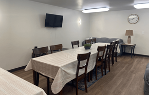 Beloit apartment for rent - A conference room with a long table and chairs.