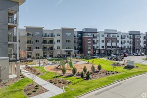 Brookfield apartment for rent - Apartment complex with a playground in the front.
