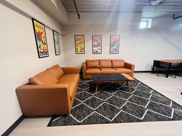 Eau Claire apartment for rent - a living room with couches and a coffee table