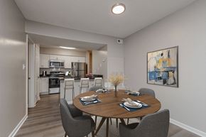Virginia Beach apartment for rent - A dining room with a table set for six.