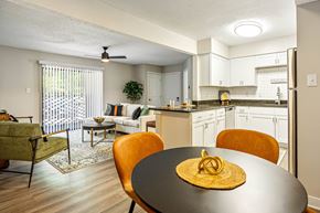 Newport News apartment for rent - A dining room with a round table and chairs.