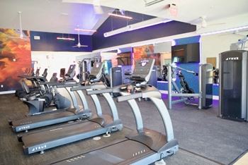 Fitness center with cardio equipment and free weights