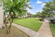 Temple apartment for rent - Manicured lawn with walkway and pool gate at Parks on the Green Apartments, Temple, 76504