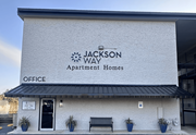 San Angelo apartment for rent - Jackson Way Apartment Homes office building with a black awning.