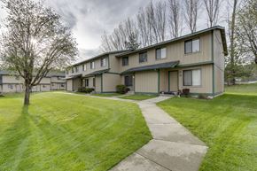 Newport apartment for rent - the view of a house with a sidewalk and grass