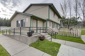 Newport apartment for rent - the front of a house with a ramp and a sidewalk