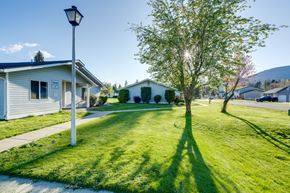 Rathdrum apartment for rent - a house with a yard and a lamp post