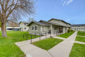 Chewelah apartment for rent - the view of a building with a sidewalk in front of it