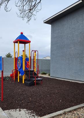 Chino Valley apartment for rent - A playground with a blue and yellow structure.