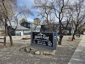 Cottonwood apartment for rent - A sign for Granite Point Apartments is in front of some buildings.