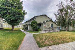 Warden apartment for rent - A residential area with houses and a walkway.
