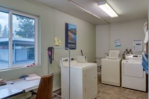Priest River apartment for rent - A laundry room with washers and dryers and a window.