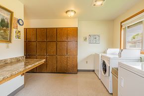 Sutherlin apartment for rent - the laundry room has a washer and dryer and plenty of space for laundry
