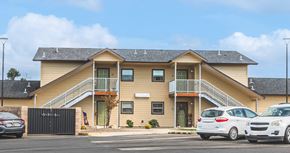 Phoenix apartment for rent - A two-story house with a balcony on the second floor.