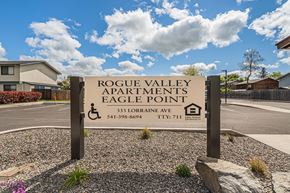 Eagle Point apartment for rent - a sign for rogue valley apartments eagle point