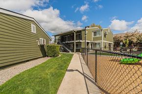 Eagle Point apartment for rent - the yards are fenced in with a chain link fence