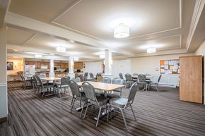 La Grande apartment for rent - A conference room with a long table and chairs.