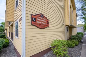 La Grande apartment for rent - A building with a sign that says La Retirement Apartments.