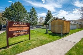 Wallowa apartment for rent - a house with a sign for the park apartments