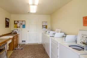 Union apartment for rent - a laundry room with washes and dryers and a sink