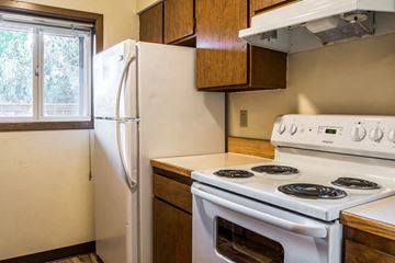 Redmond apartment for rent - a kitchen with a stove and a refrigerator