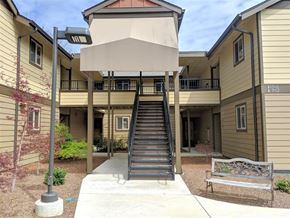Jacksonville apartment for rent - a staircase leading up to an apartment building with a bench