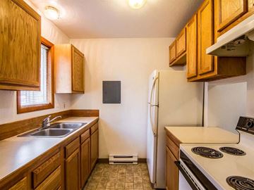 Milton-Freewater apartment for rent - a kitchen with a stove sink and refrigerator