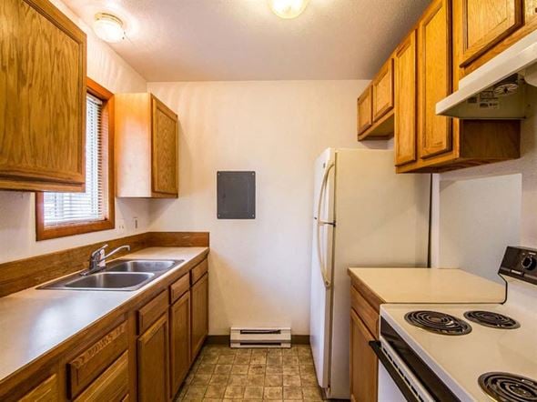Milton-Freewater apartment for rent - a kitchen with a stove sink and refrigerator