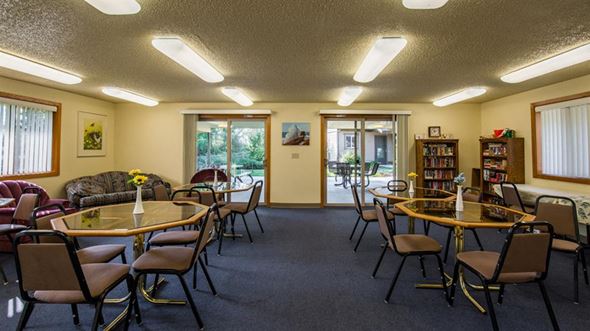Phoenix apartment for rent - a conference room with tables and chairs and a fireplace