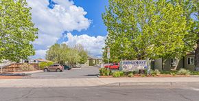 Redmond apartment for rent - a street with a sign in front of a row of houses